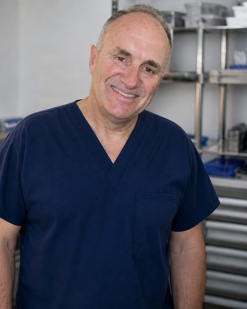 Scott Lewis, owner of Specialty Surgical Services, in scrubs at the repair workshop